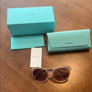 Tiffany & Co. Pink Sunglasses with Elegant Design. New